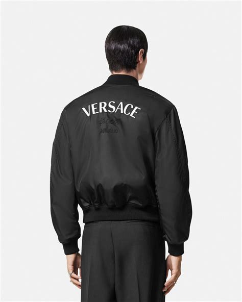 blue versace bomber jacket|Versace trench jacket men.